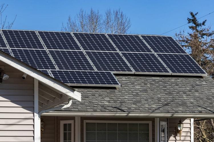 Solar panels on home rooftops are one source of renewable electricity
